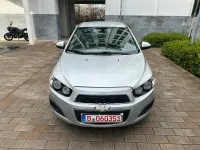 Gebraucht Chevrolet Aveo 101 PS (74 kW) 2012 Silber Limousine