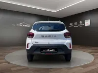 Gebraucht Dacia Spring Extreme 47 kW (65 PS) 2023 Polarweiss Kleinwagen