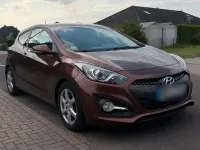 Gebraucht Hyundai i30 128 PS (94 kW) 2013 Orange Coupé