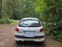 Gebraucht Peugeot 206 73 PS (53 kW) 2012 Weiß Limousine