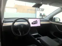 Gebraucht Tesla Model Y Standard Range 225 kW (306 PS) 2024 Grau SUV