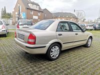 Gebraucht Mazda 323 Comfort 72 PS (52 kW) 2000 Gold Limousine