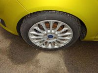 Gebraucht Ford Fiesta Titanium 101 PS (74 kW) 2013 Gelb Kleinwagen