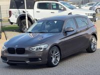 Gebraucht BMW 118 Advantage 143 PS (105 kW) 2015 Braun Kleinwagen