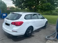 Używany Opel Astra 110 KM (80 kW) 2013 Biały Kombi