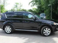 Używany Mitsubishi Outlander Invite 156 KM (114 kW) 2012 Czarny SUV