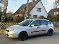 Occasion Ford Focus Ghia 101 ch (74 kW) 2001 Argent Berline