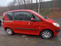 Gebraucht Peugeot 1007 Premium 73 PS (53 kW) 2006 Rot Van / Kleinbus