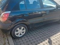 Second-hand Kia Rio 110 CP (80 kW) 2006 Negru Hatchback