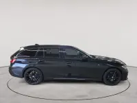 Gebraucht BMW 330 M Sport 184 PS (135 kW) 2021 Saphirschwarz metallic Kombi