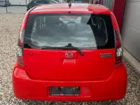 Gebraucht Daihatsu Sirion 69 PS (50 kW) 2009 Rot Kleinwagen