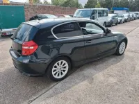 Używany BMW 116 Performance 122 KM (89 kW) 2010 Czarny Hatchback