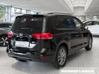 Gebraucht VW Touran Comfortline 150 PS (110 kW) 2026 Grenadillschwarz (schwarz) Van / Kleinbus