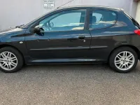 Gebraucht Peugeot 206 75 PS (55 kW) 2011 Grau Kleinwagen