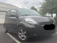 Gebraucht Daihatsu Sirion 91 PS (66 kW) 2010 Schwarz Kleinwagen