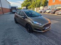 Gebraucht Ford Fiesta Trend 101 PS (74 kW) 2013 Braun Kleinwagen