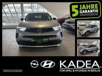 Gebraucht Opel Mokka Elegance 101 PS (74 kW) 2022 Kontrast grau/quarz silber (metallic) SUV