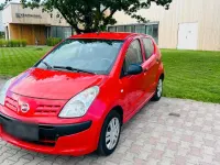 Gebraucht Nissan Pixo 68 PS (50 kW) 2010 Rot Kleinwagen