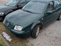 Second-hand VW Bora 101 CP (74 kW) 1999 Verde Berlinǎ