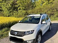 Używany Dacia Sandero Prestige 90 KM (66 kW) 2014 Biały Hatchback