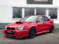 Second-hand Subaru Impreza 265 CP (194 kW) 2003 Roșu Berlinǎ