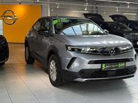 Gebraucht Opel Mokka 131 PS (96 kW) 2023 Kontrast grau/quarz silber (metallic) SUV