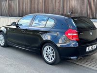 Gebraucht BMW 116 122 PS (89 kW) 2009 Schwarz Kleinwagen