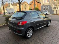 Gebraucht Peugeot 206+ 68 PS (50 kW) 2011 Lack grau shark/metallic Kleinwagen