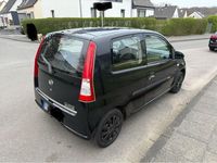 Gebraucht Daihatsu Cuore 58 PS (42 kW) 2006 Schwarz Kleinwagen