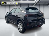 Gebraucht Opel Mokka Enjoy 131 PS (96 kW) 2023 Lackierung schwarz perla nera/ SUV