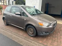 Gebraucht Mitsubishi Colt 75 PS (55 kW) 2012 Braun Kleinwagen