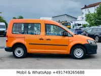 Używany VW Caddy 102 KM (75 kW) 2011 Pomarańczowy Minivan