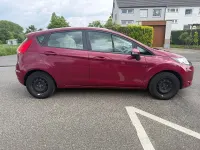 Używany Ford Fiesta 82 KM (60 kW) 2010 Czerwony Hatchback