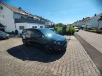 Gebraucht VW Touran Life 105 PS (77 kW) 2013 Schwarz Van / Kleinbus