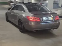 Używany Mercedes E500 402 KM (295 kW) 2010 Beżowy Coupe