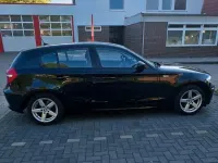 Gebraucht BMW 116 122 PS (89 kW) 2009 Schwarz Kleinwagen
