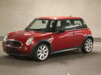 Gebraucht Mini Cooper D Seven 88 PS (64 kW) 2006 Solar red metallic Kleinwagen