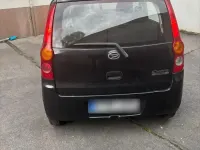 Gebraucht Daihatsu Cuore 70 PS (51 kW) 2009 Schwarz Kleinwagen