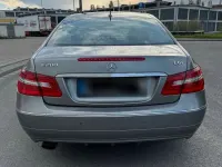 Second-hand Mercedes E200 184 CP (135 kW) 2011 Argintiu Coupe