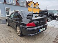 Second-hand Mitsubishi Lancer Evolution 280 CP (205 kW) 2001 Negru Berlinǎ