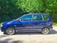 Begagnad Mitsubishi Space Star Motion 98 HK (72 kW) 2004 Blå Minibuss