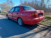 Gebraucht Mitsubishi Carisma 120 PS (88 kW) 1999 Rot Limousine