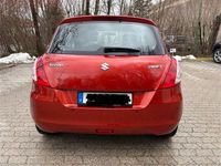 Usado Suzuki Swift Basic 94 HP (69 kW) 2011 Laranja Citadino