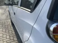 Używany Chevrolet Spark 68 KM (50 kW) 2011 Biały Hatchback