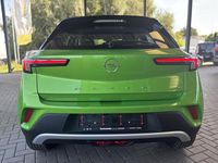 Gebraucht Opel Mokka-e Elegance 100 kW (136 PS) 2023 Ikone grün (metallic) SUV