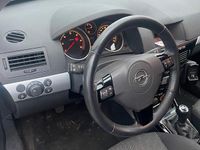 Second-hand Opel Astra 110 CP (80 kW) 2010 Negru Break