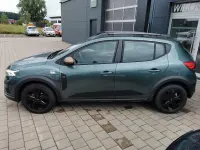Gebraucht Dacia Sandero Extreme 110 PS (80 kW) 2024 Zedern grün Kleinwagen