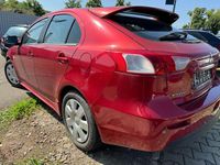 Gebraucht Mitsubishi Lancer Inform 140 PS (102 kW) 2009 Rot Limousine