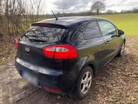 Gebraucht Kia Rio 90 PS (66 kW) 2012 Schwarz Kleinwagen