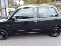 Gebraucht Daihatsu Cuore 56 PS (41 kW) 1999 Schwarz Kleinwagen